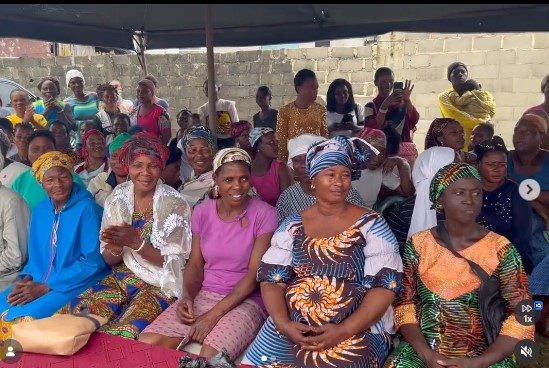 Community members gathered at a foundation outreach